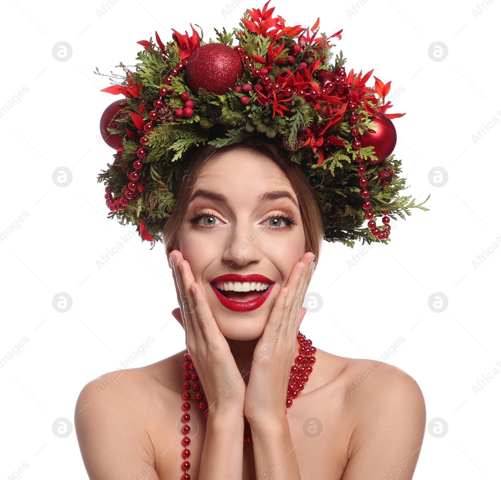 Photo of Emotional young woman wearing Christmas wreath on white background