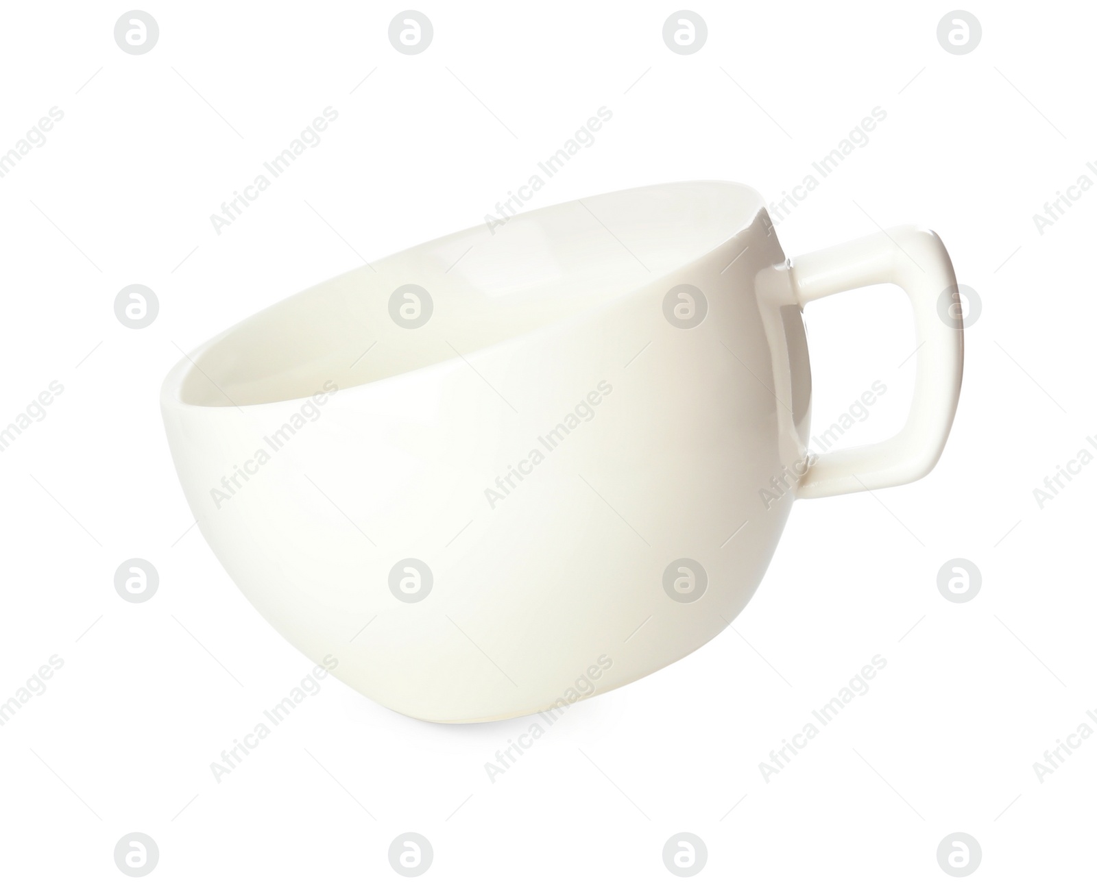 Photo of Clean empty ceramic cup isolated on white