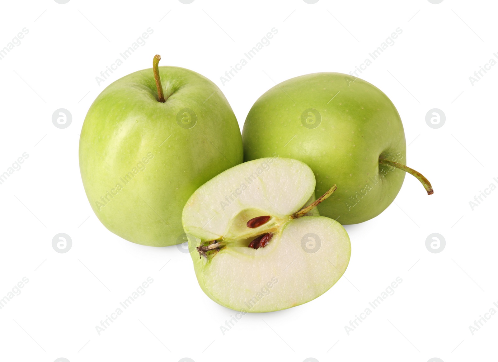 Photo of Whole and cut green apples isolated on white