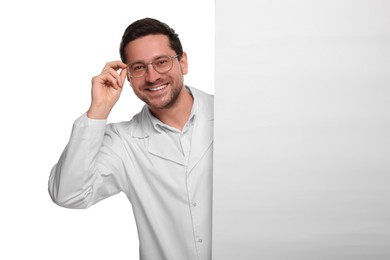 Photo of Ophthalmologist with blank banner on white background, space for text
