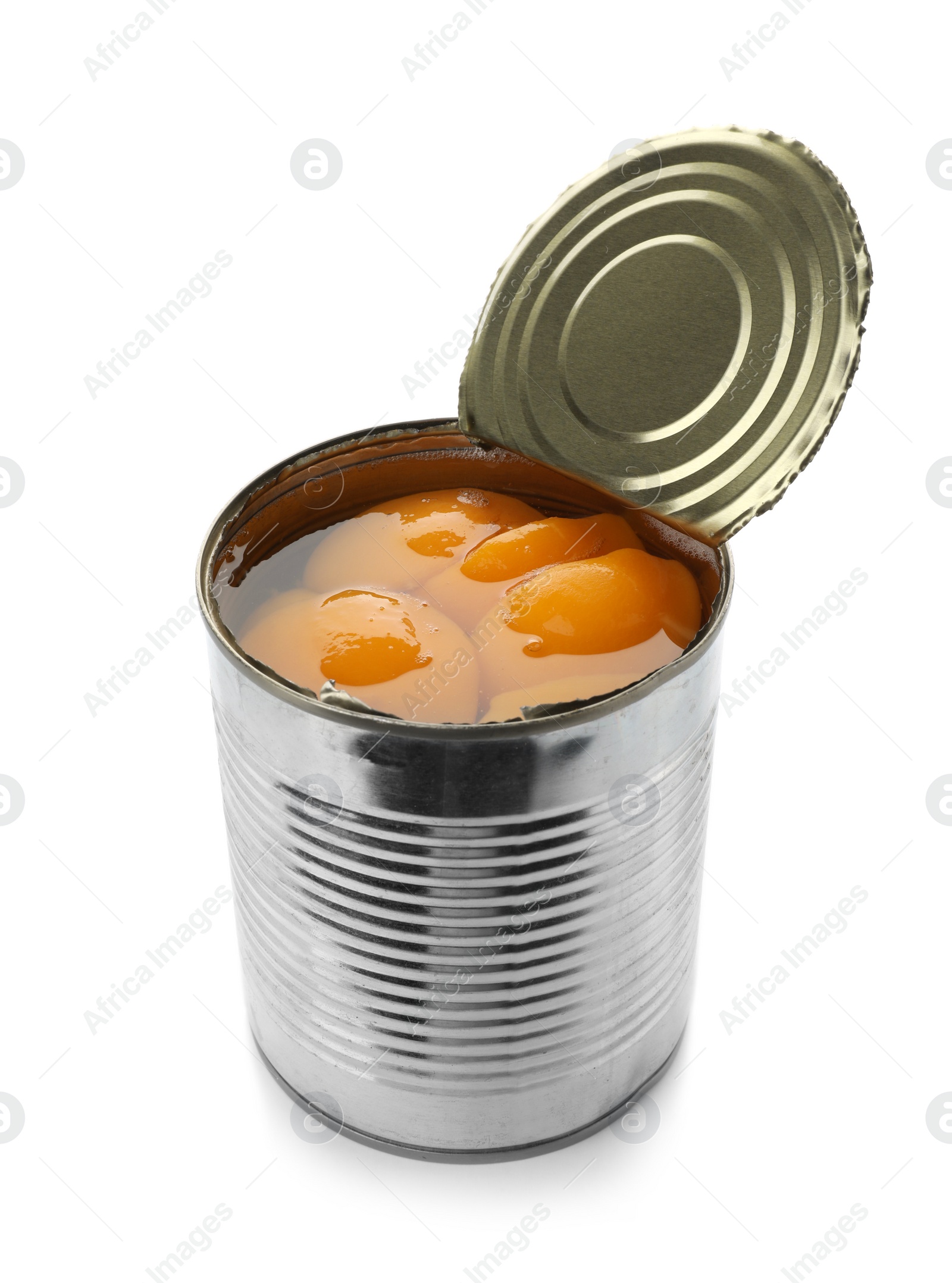 Photo of Tin can with conserved peach halves on white background