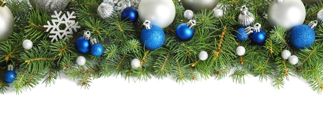 Fir tree branches with Christmas decoration on white background, flat lay