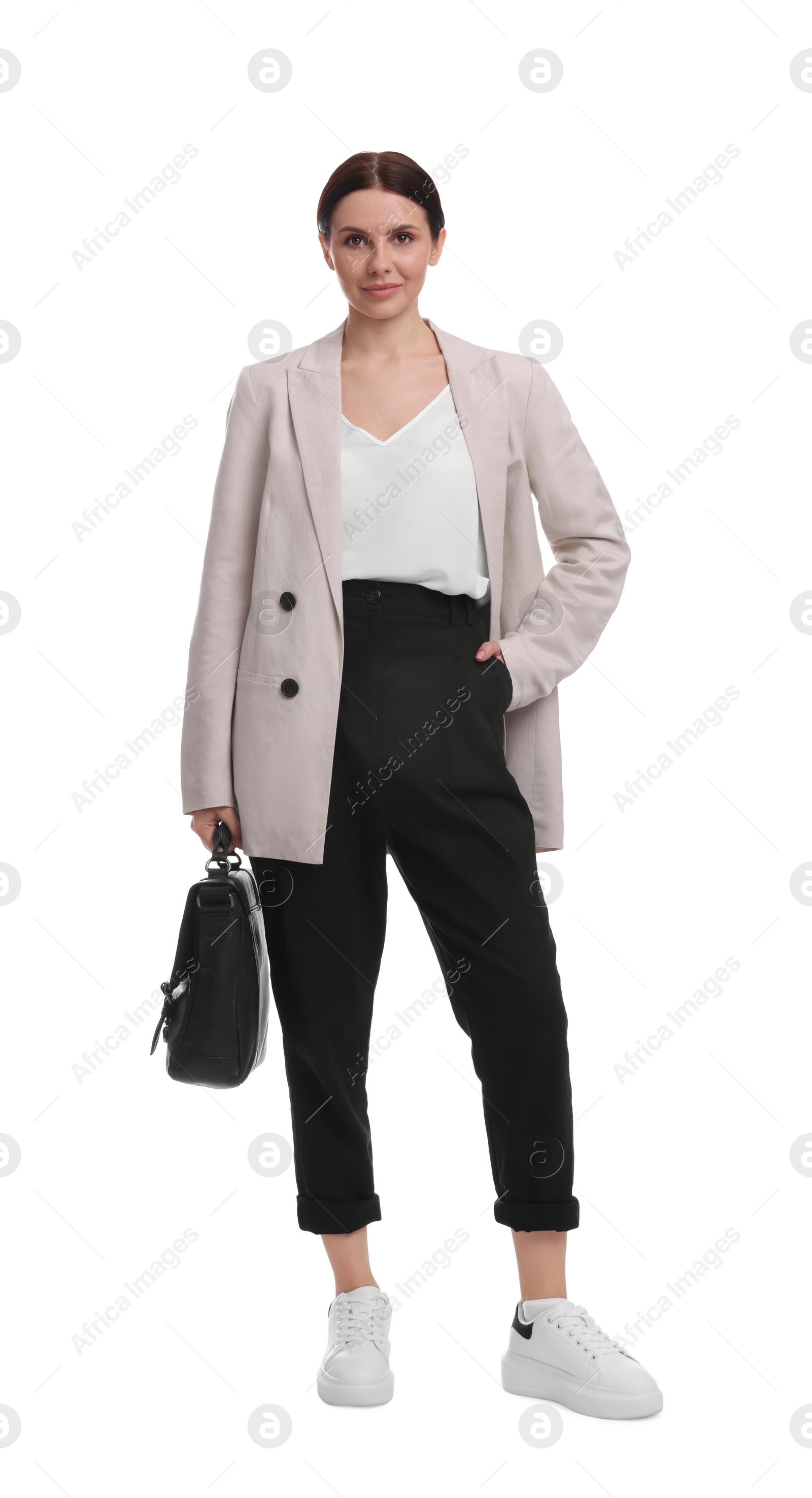 Photo of Beautiful businesswoman in suit with briefcase walking on white background