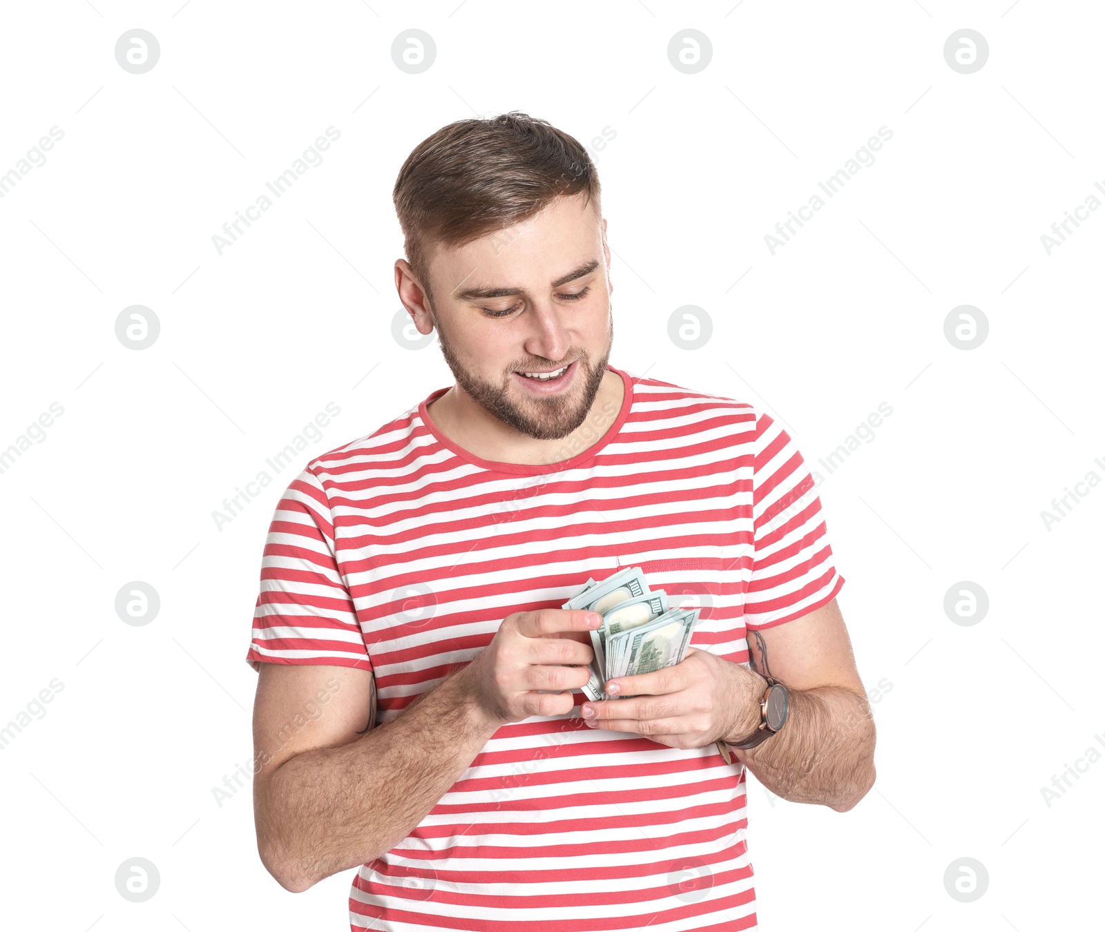 Photo of Portrait of young man counting money banknotes on white background