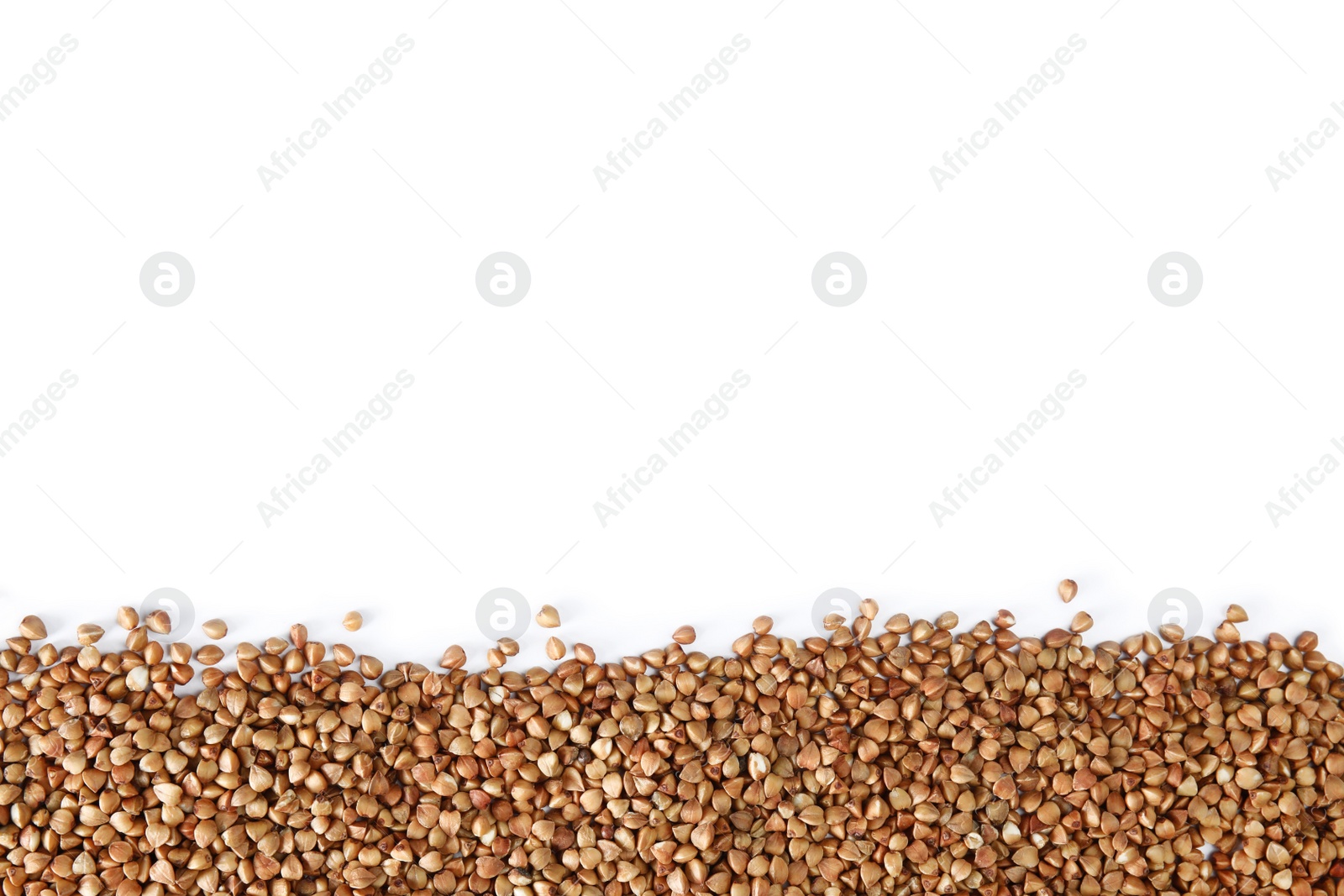 Photo of Uncooked buckwheat on white background, top view