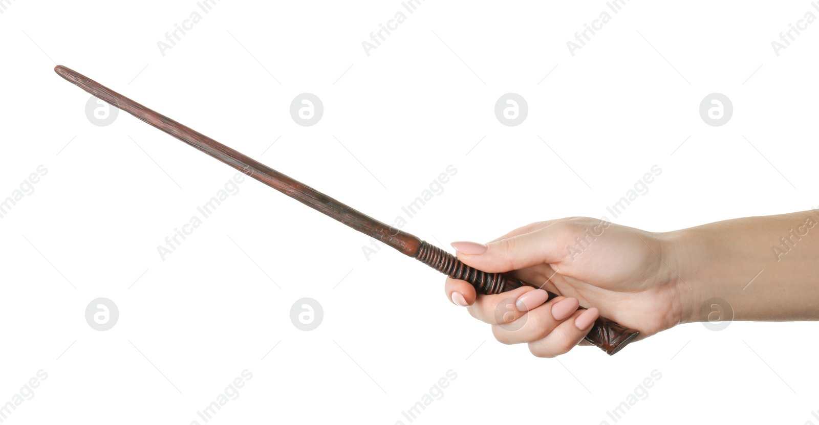 Photo of Woman holding magic wand on white background, closeup