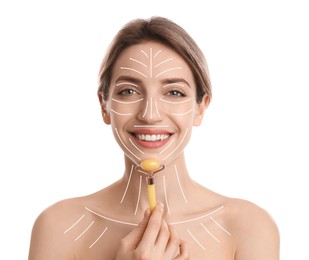 Image of Young woman using natural jade face roller on white background