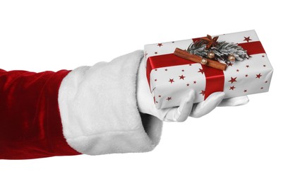 Photo of Merry Christmas. Santa Claus holding gift box decorated with fir and spices on white background, closeup