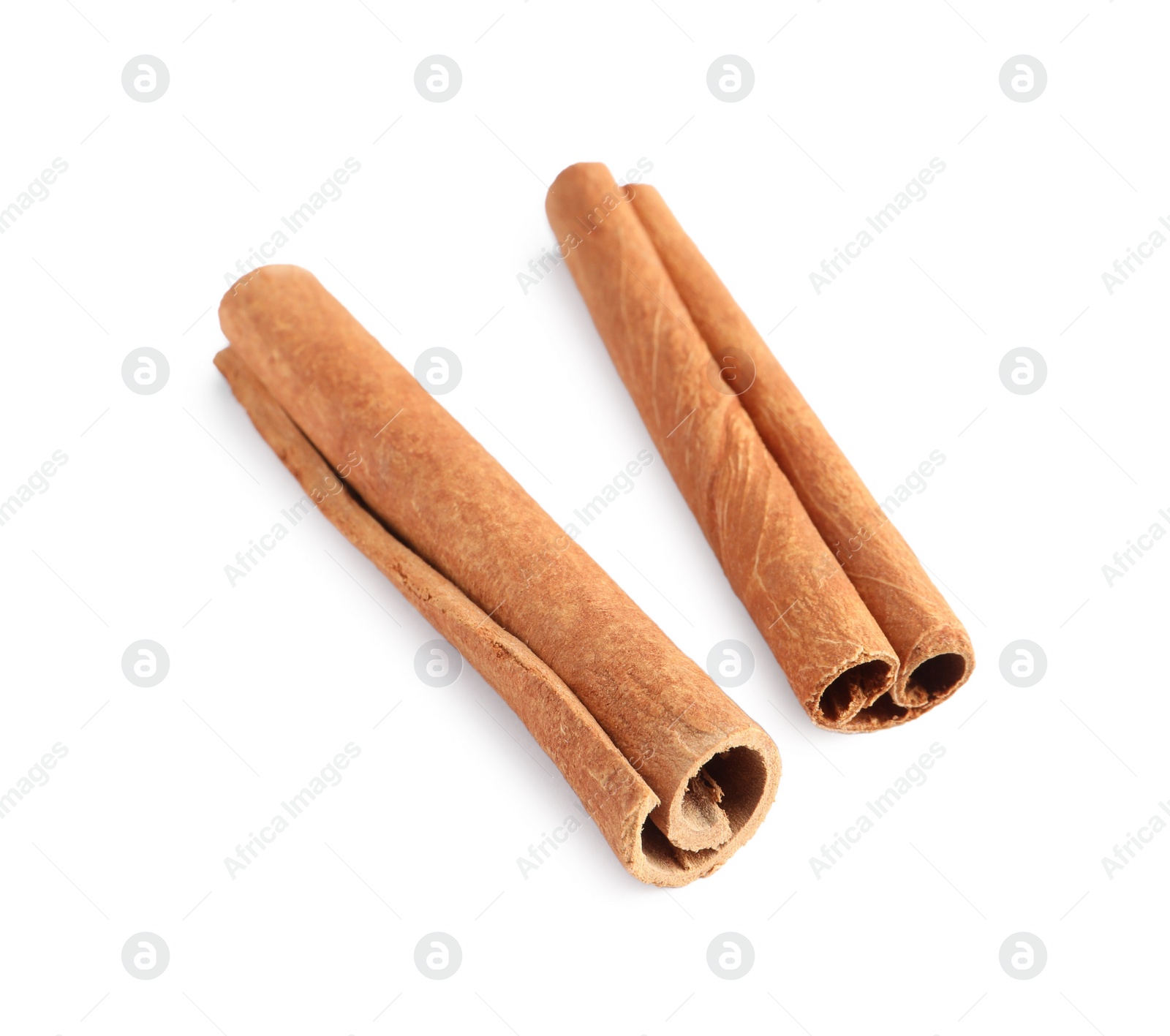 Photo of Two aromatic cinnamon sticks isolated on white