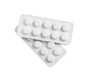 Blisters of pills on white background, top view