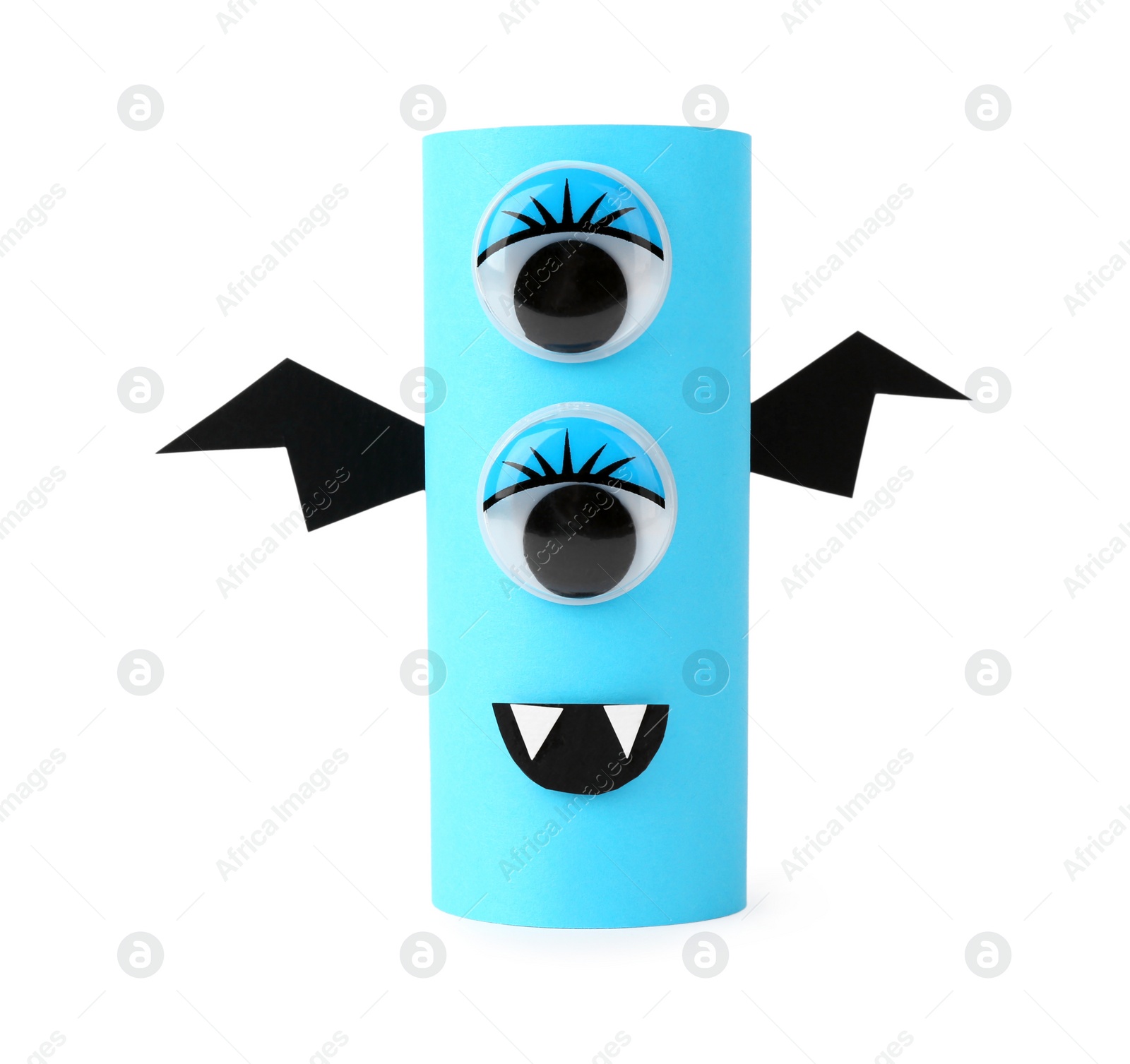 Photo of Monster made of light blue paper isolated on white. Halloween decoration