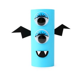 Photo of Monster made of light blue paper isolated on white. Halloween decoration