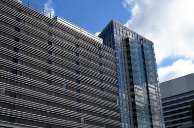 Photo of Exterior of beautiful buildings against blue sky