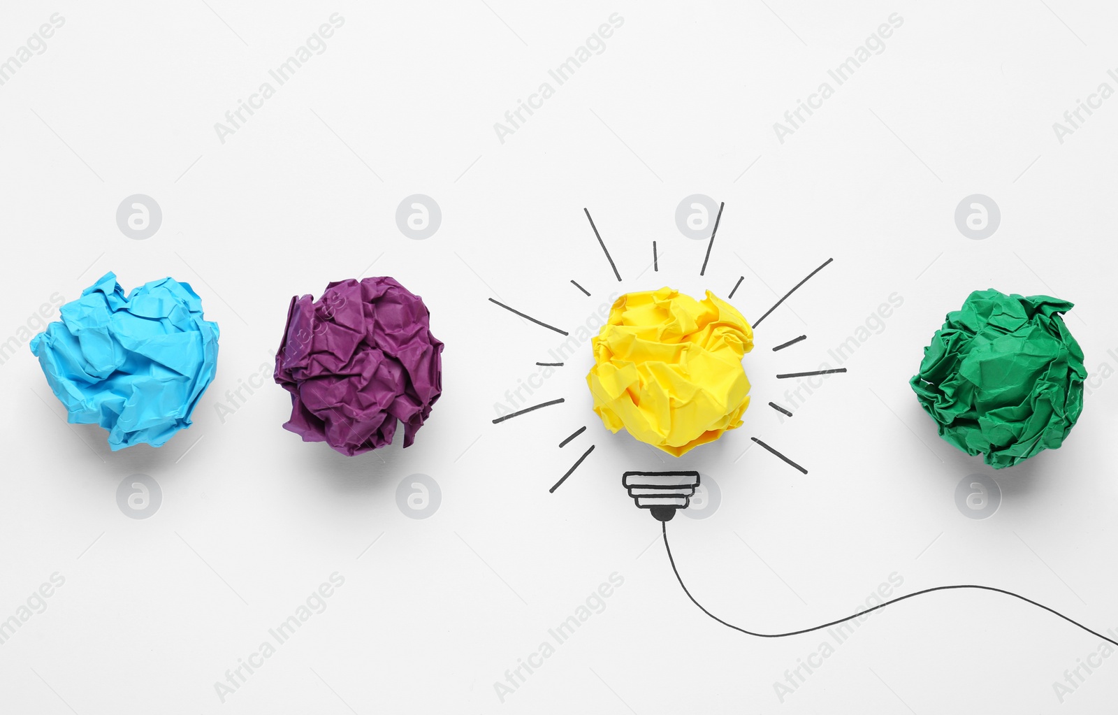 Photo of Creative flat lay composition with colorful paper balls on white background. Idea concept