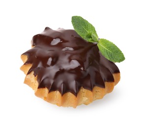 One delicious profiterole with chocolate spread and mint isolated on white