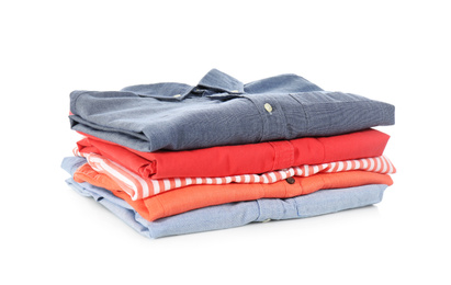 Photo of Stack of folded clothes isolated on white