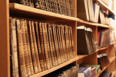 Image of Collection of old books on shelves in library