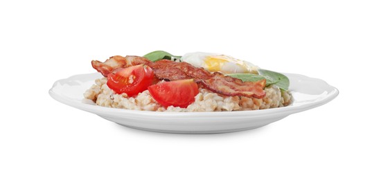 Photo of Delicious boiled oatmeal with poached egg, bacon and tomato isolated on white