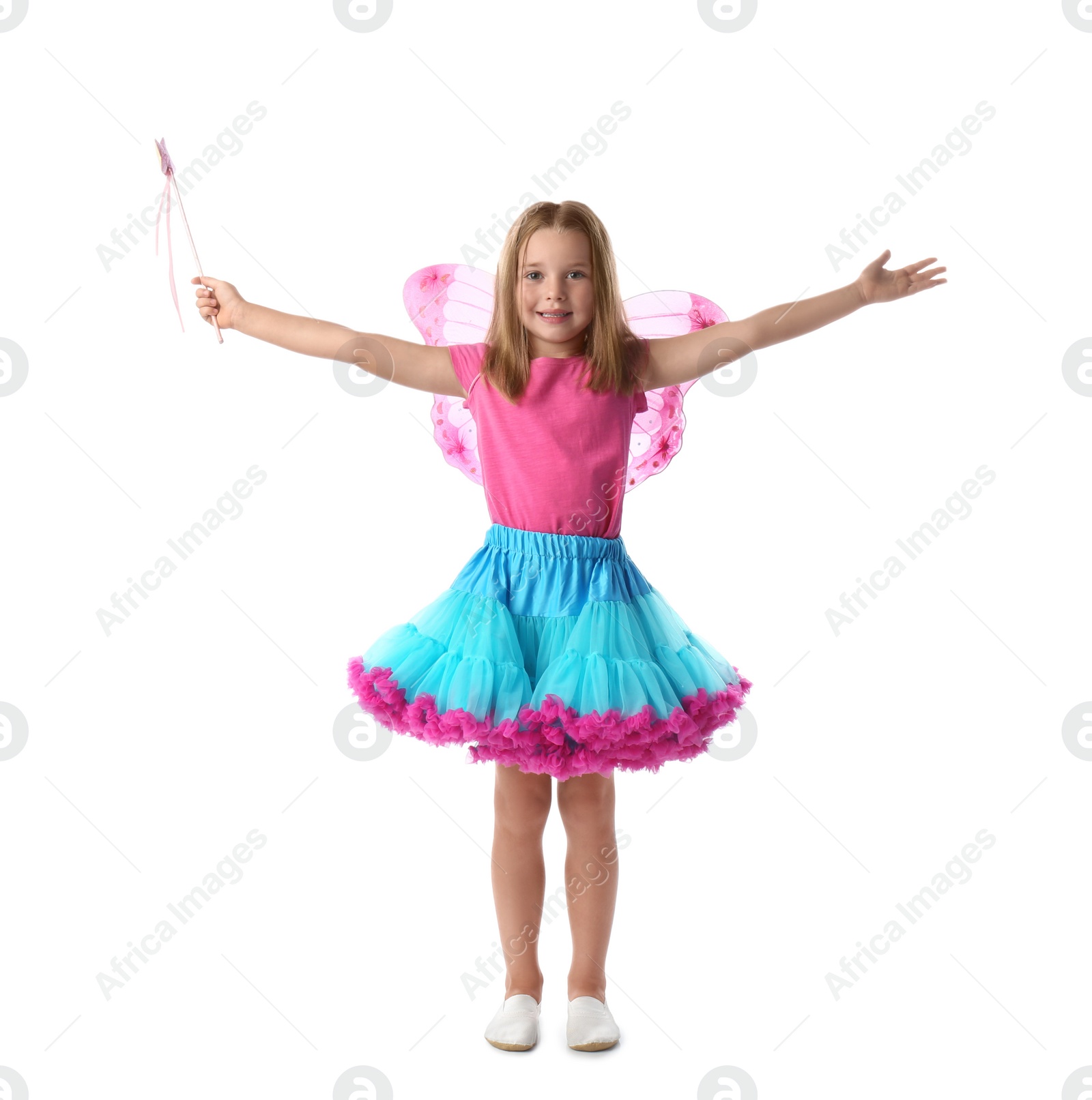 Photo of Cute little girl in fairy costume with pink wings and magic wand on white background