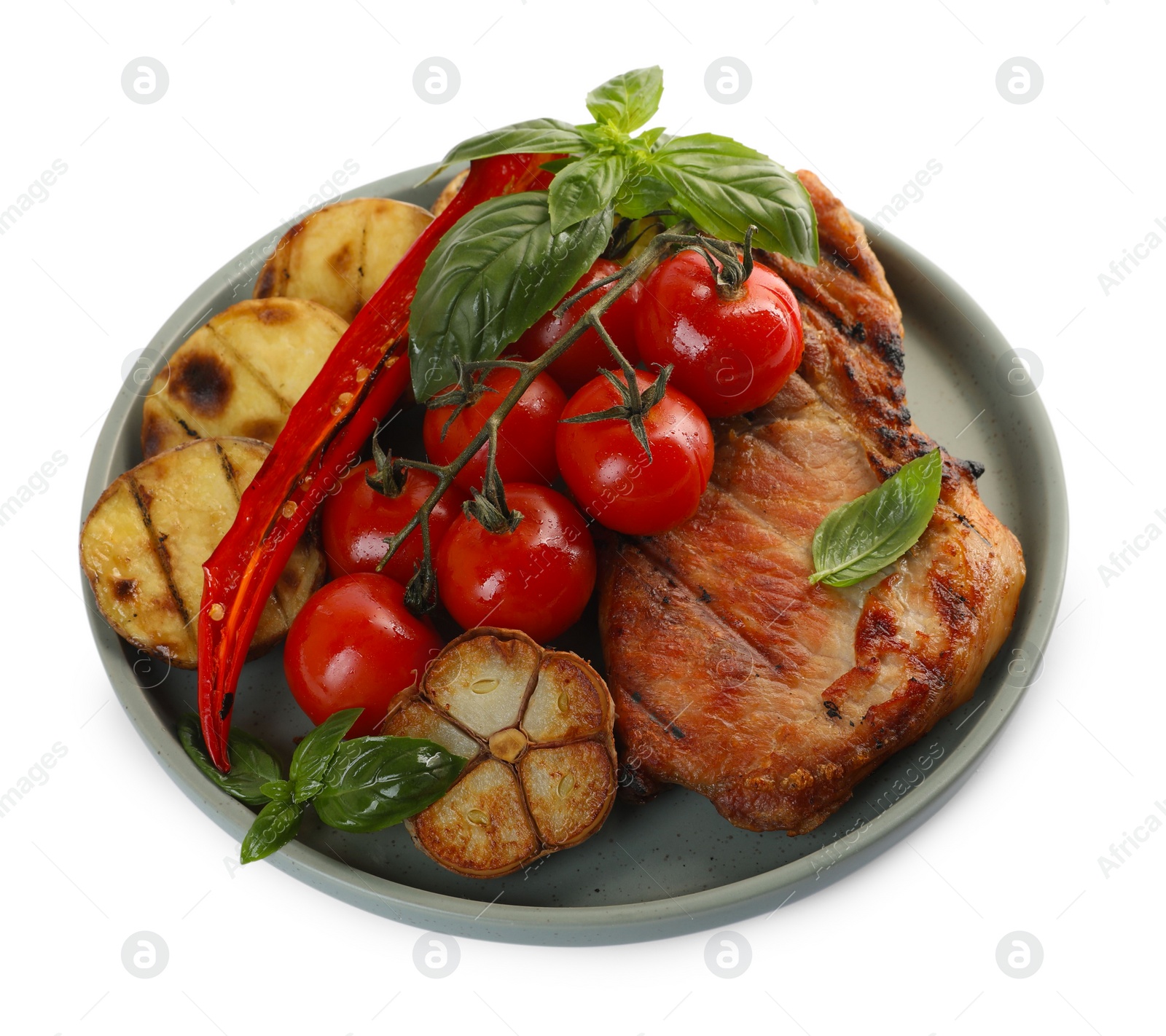 Photo of Plate with tasty grilled vegetables, meat and basil isolated on white