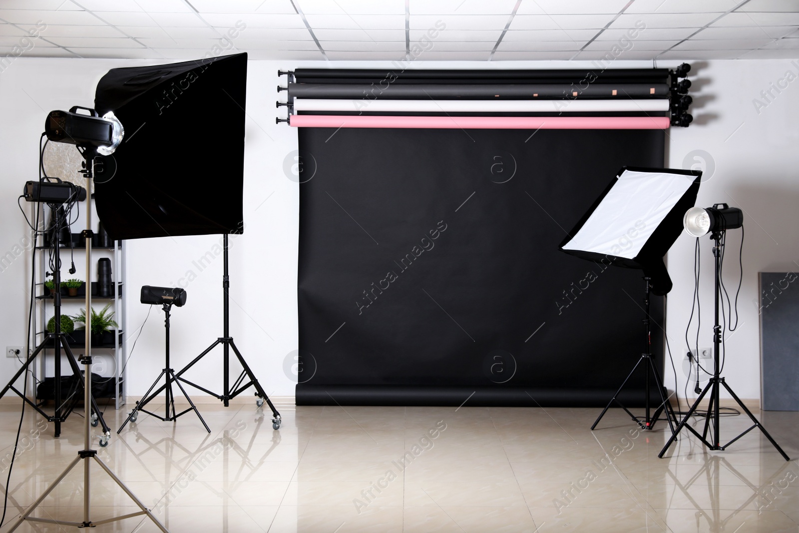 Photo of Photo studio interior with set of professional equipment