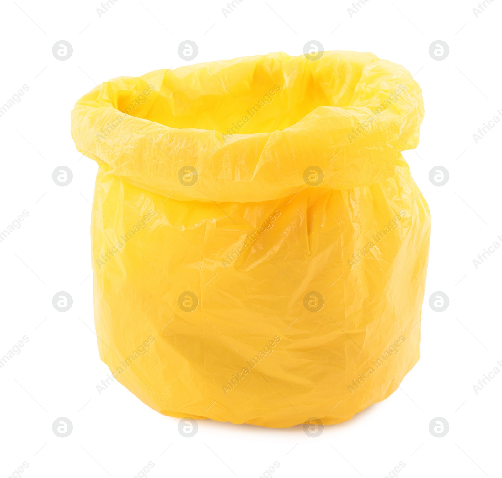 Photo of Yellow plastic garbage bag isolated on white