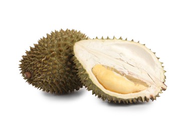 Cut and whole ripe durians on white background