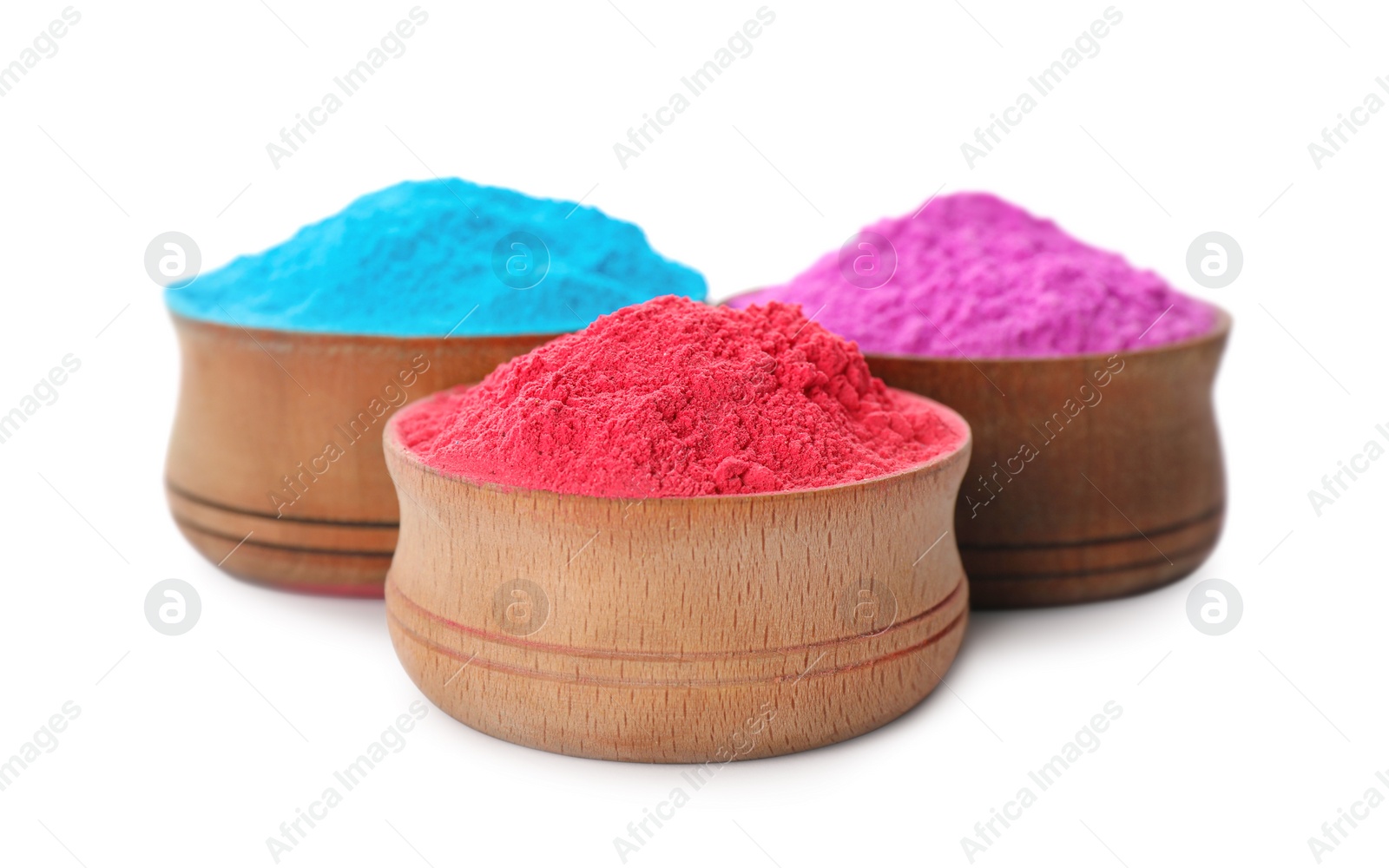 Photo of Colorful powder dyes in bowls on white background. Holi festival