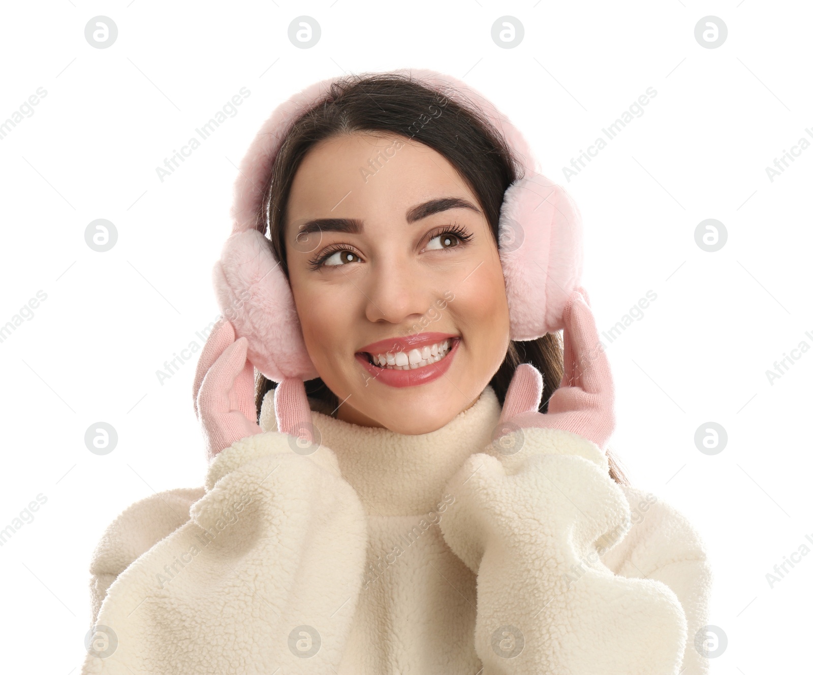 Photo of Beautiful young woman wearing earmuffs on white background