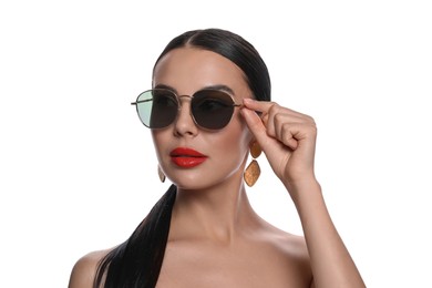 Photo of Attractive woman wearing fashionable sunglasses against white background
