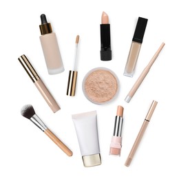 Face powder, concealers, liquid foundations and brush isolated on white. Collection of makeup products