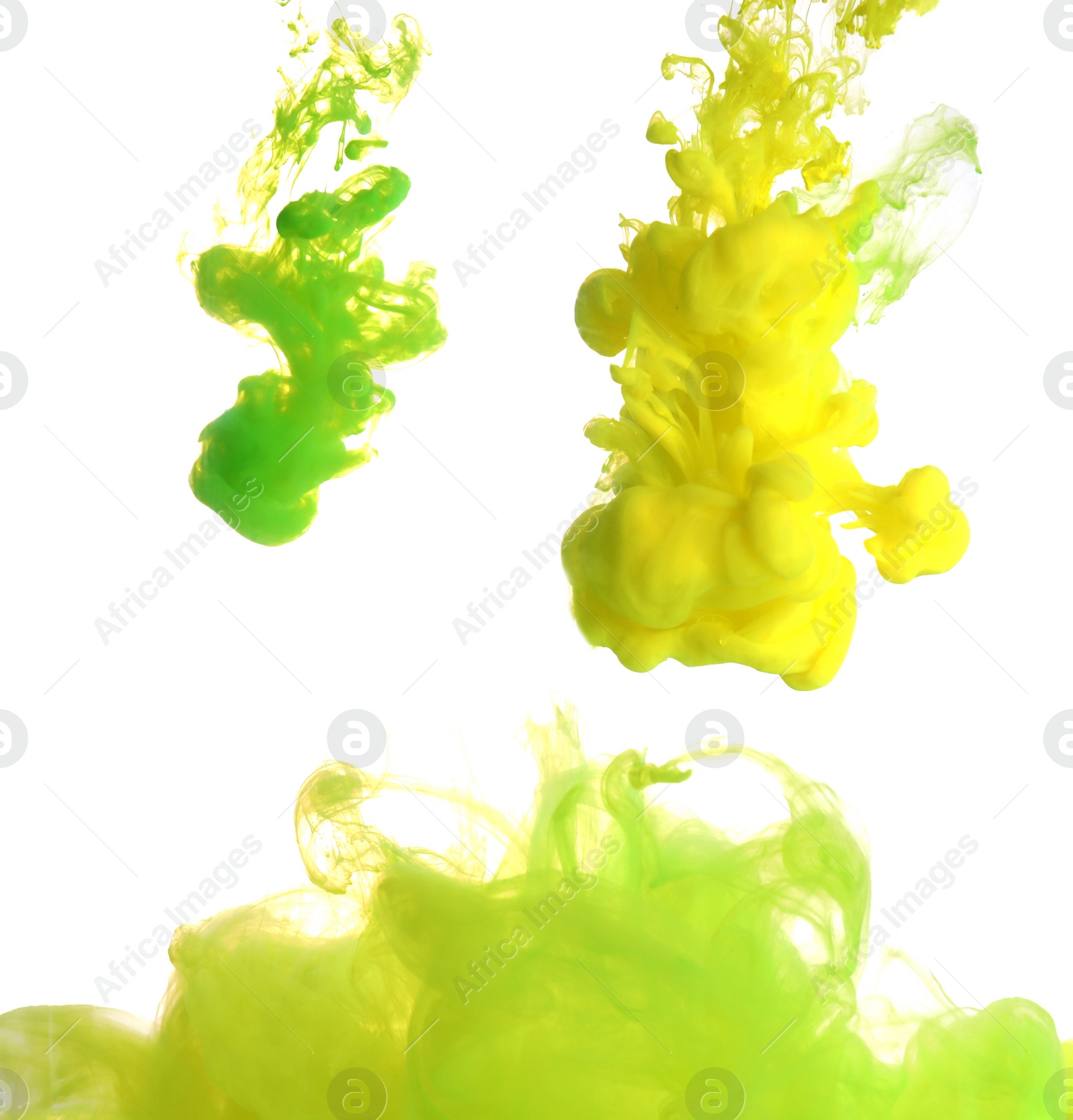 Photo of Splashes of yellow and green inks on light background, closeup