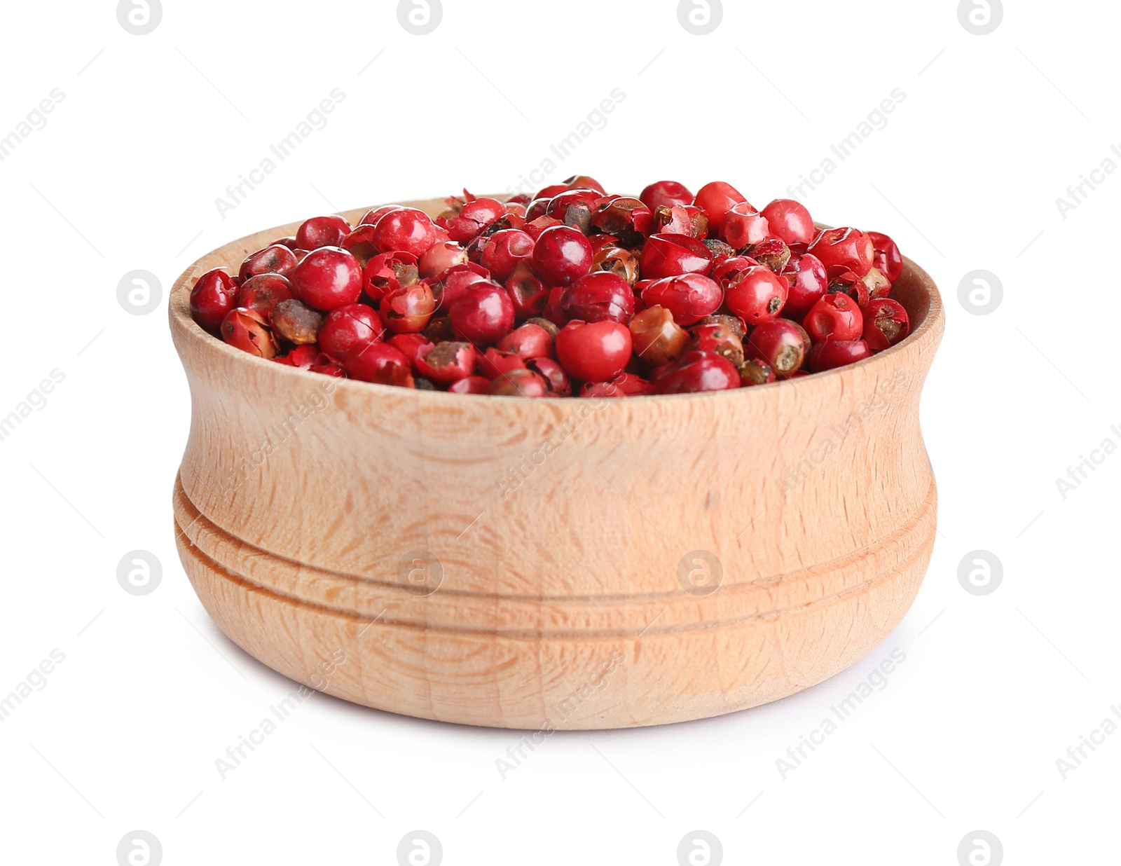 Photo of Bowl of red peppercorns isolated on white