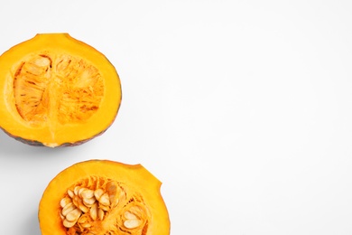 Photo of Fresh ripe pumpkins on white background, top view. Holiday decoration