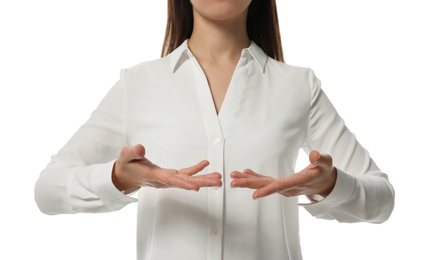Businesswoman holding something on white background, closeup