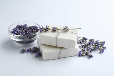 Photo of Hand made soap bars with lavender flowers on white background
