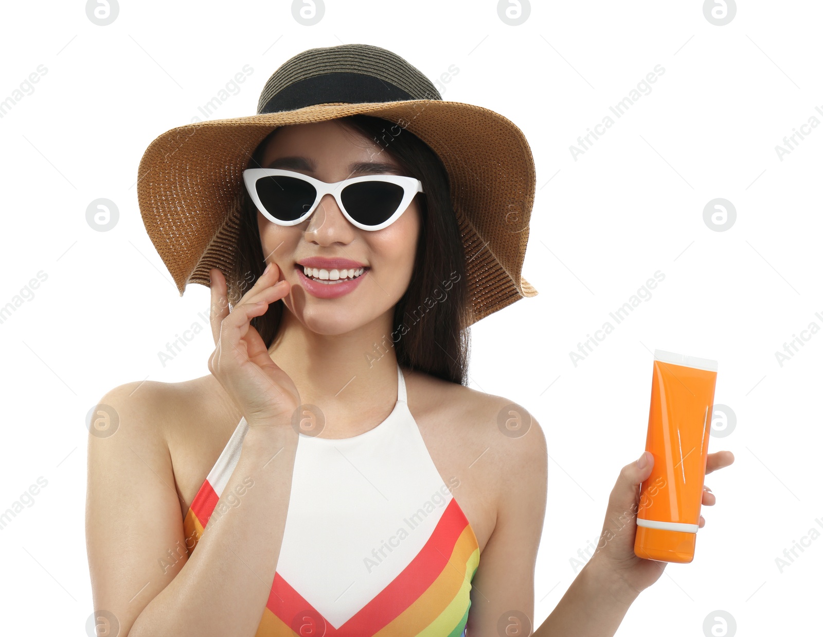 Photo of Young woman with sun protection cream on white background