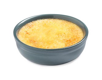 Photo of Delicious creme brulee in ceramic ramekin isolated on white