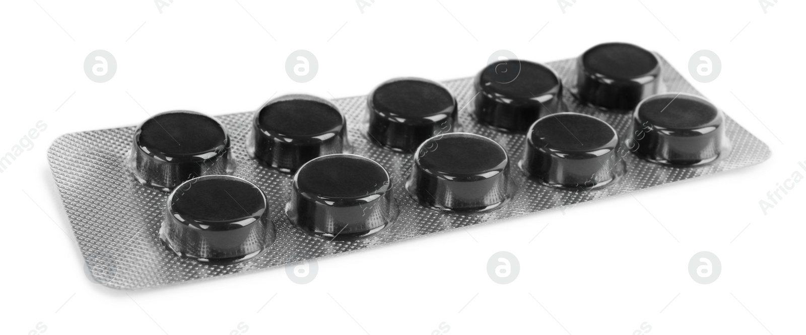 Photo of Activated charcoal pills in blister isolated on white. Potent sorbent