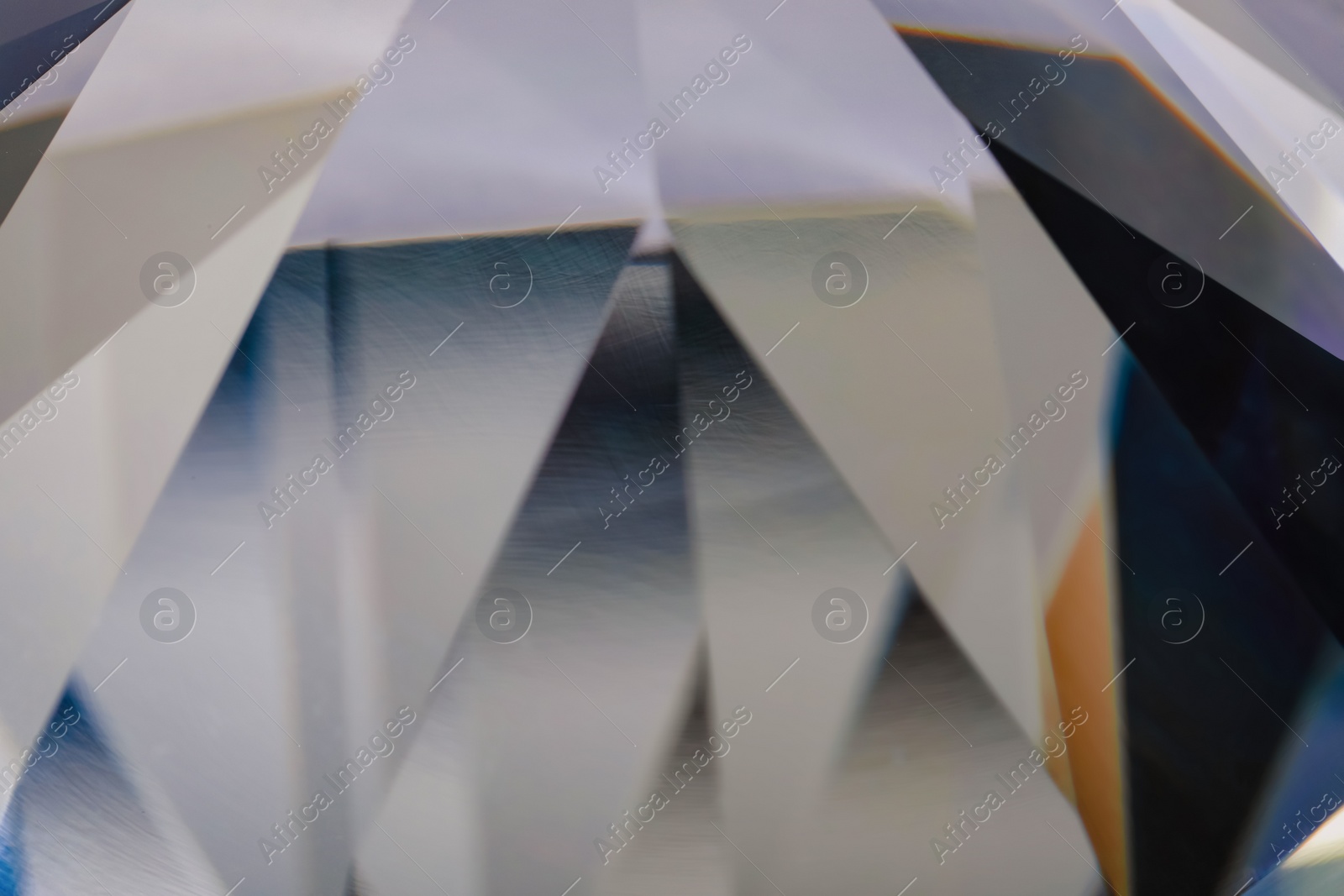 Photo of Beautiful dazzling diamond as background, closeup view