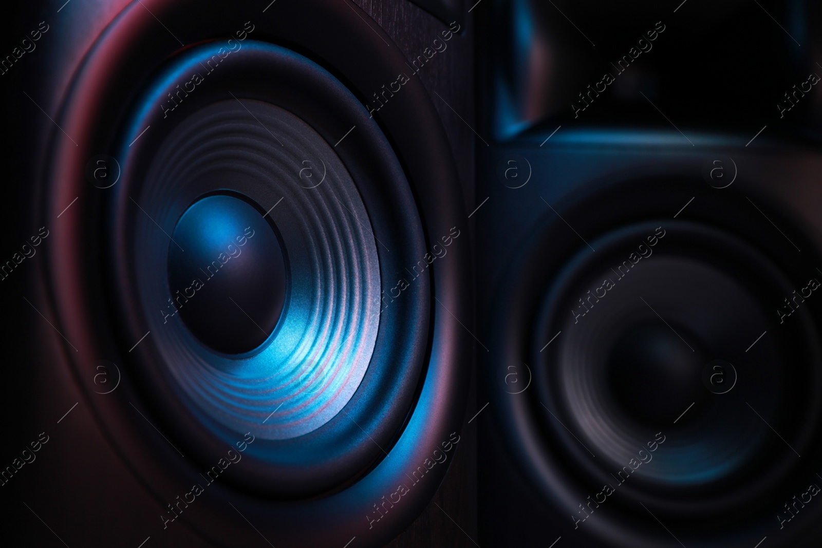 Photo of Modern sound speakers as background, closeup view