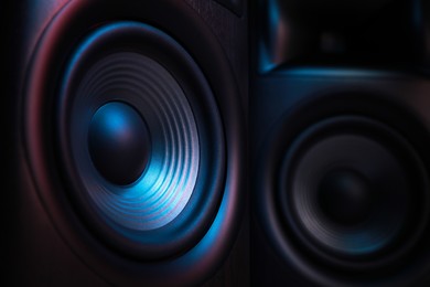 Photo of Modern sound speakers as background, closeup view