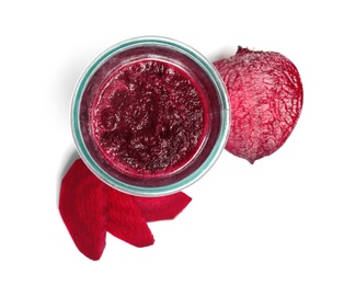 Glass of beet smoothie on white background, top view