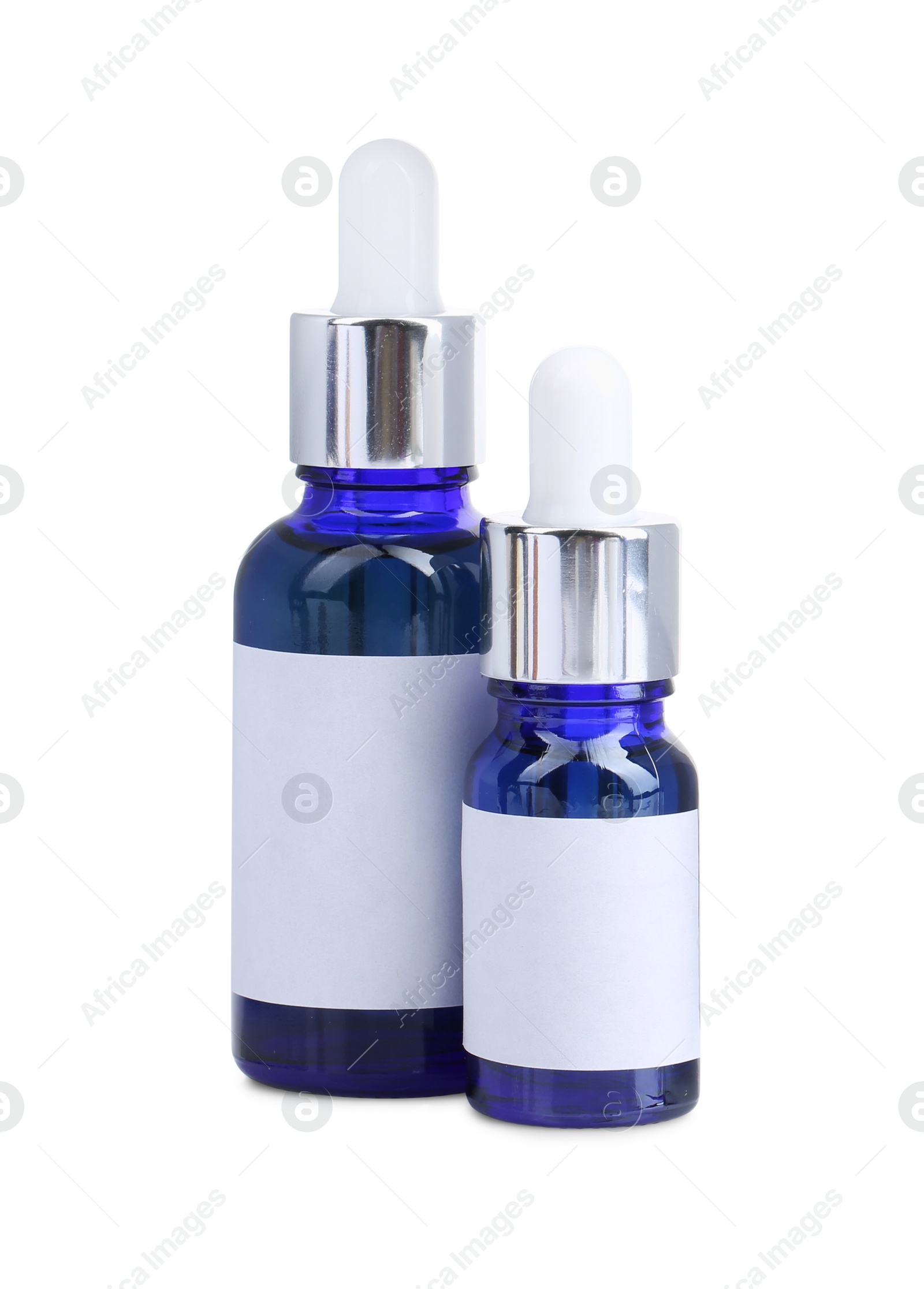 Photo of Blue bottles with tincture isolated on white