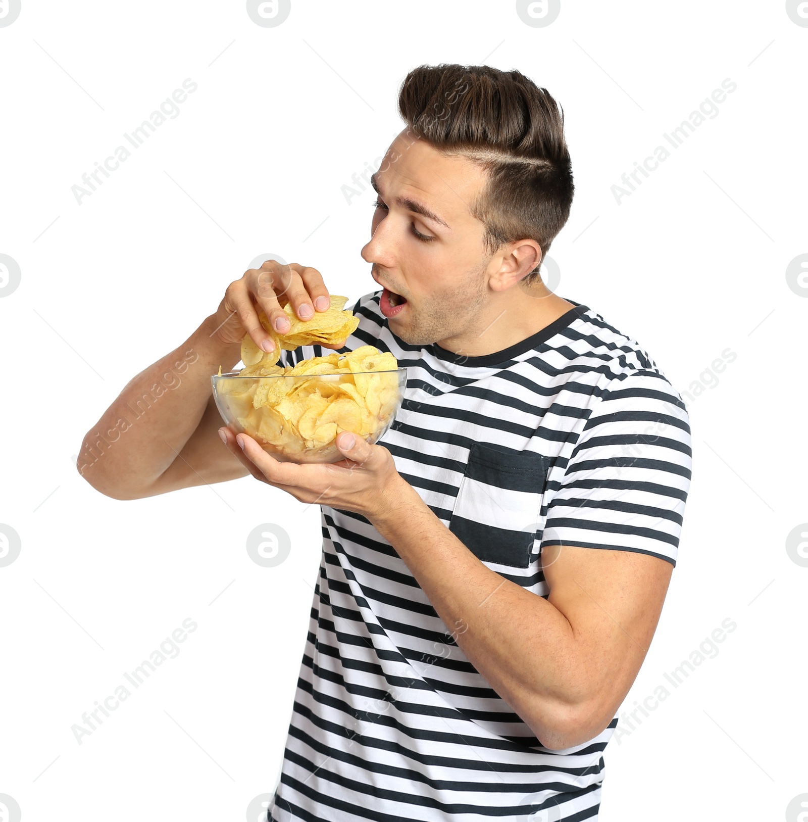 Photo of Man eating potato chips on white background