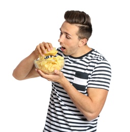 Photo of Man eating potato chips on white background