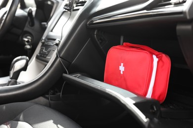 Photo of First aid kit with medicaments inside car