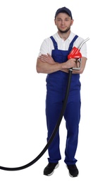 Photo of Gas station worker with fuel nozzle on white background