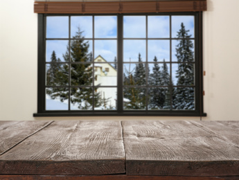 Image of Empty wooden table and window with beautiful view indoors