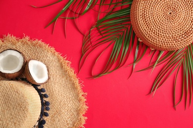 Photo of Flat lay composition with bamboo bag and straw hat on color background